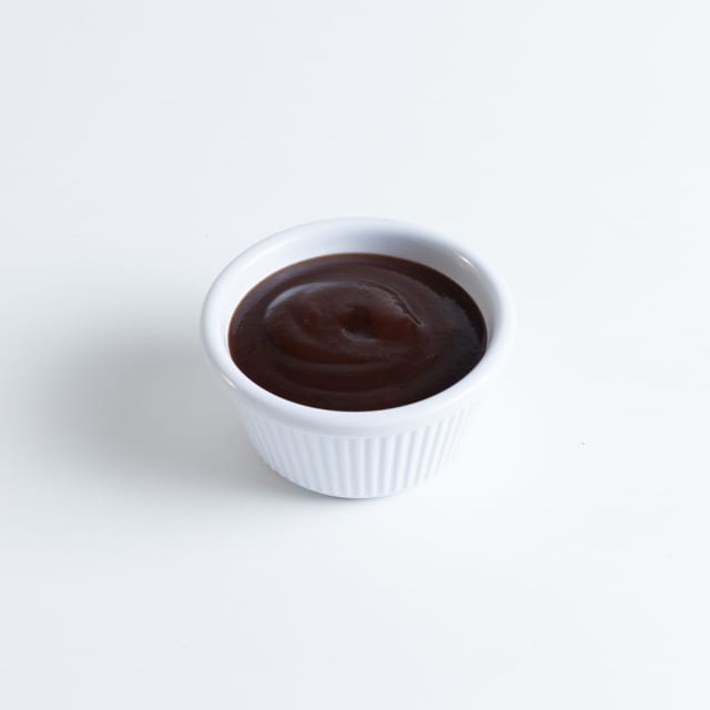 Cup of BBQ Sauce.